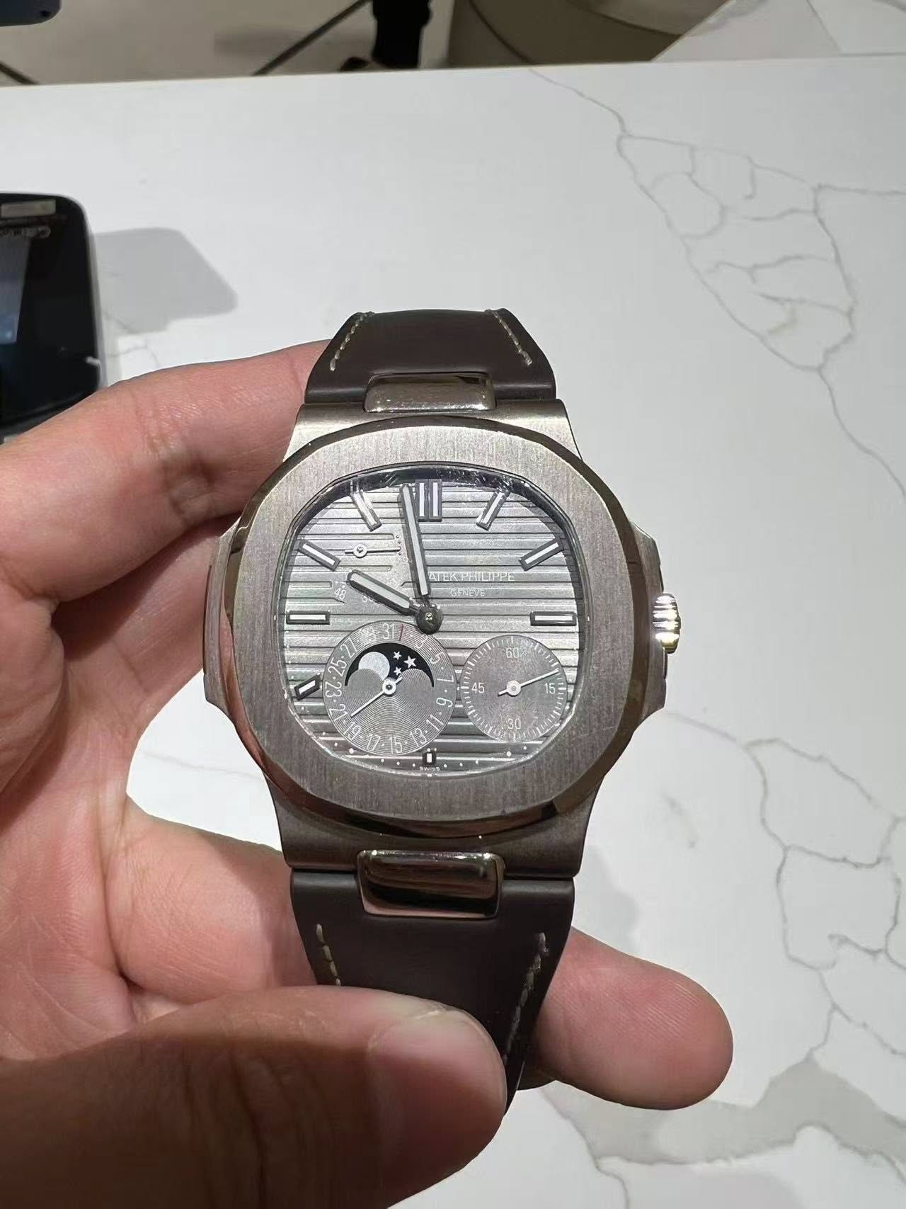 May be an image of wrist watch and text that says '45 o 115 X'