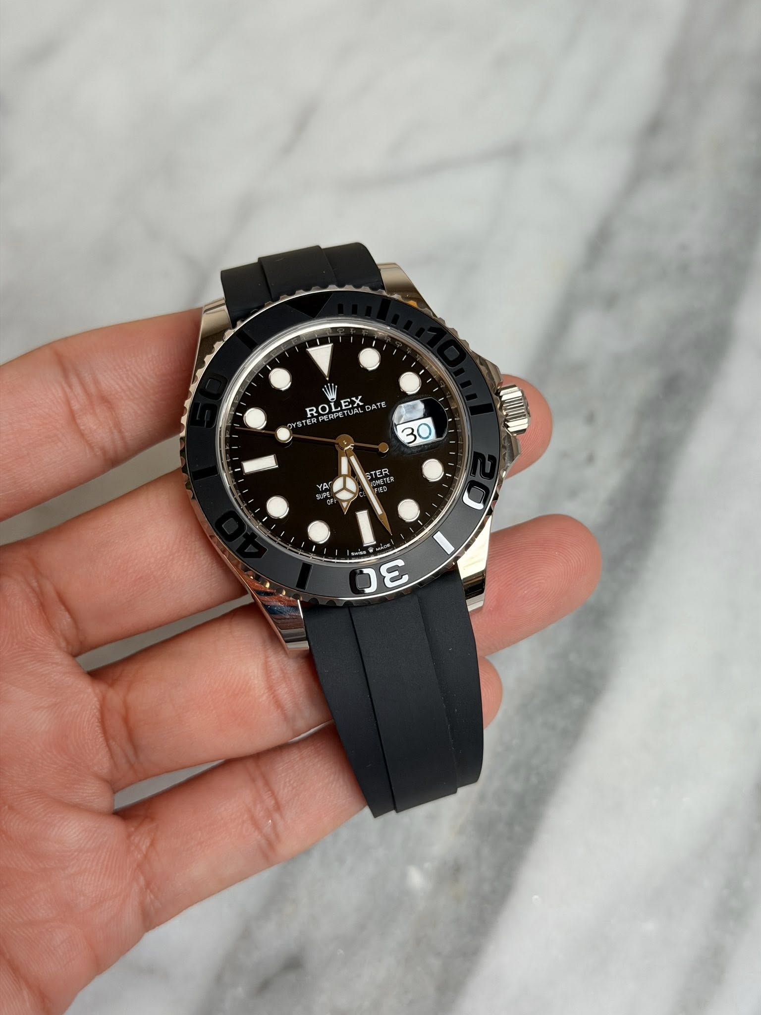 May be an image of wrist watch and text that says 'ROL ERPERPE はで ROLEX LEX 30 TEA 3C W'