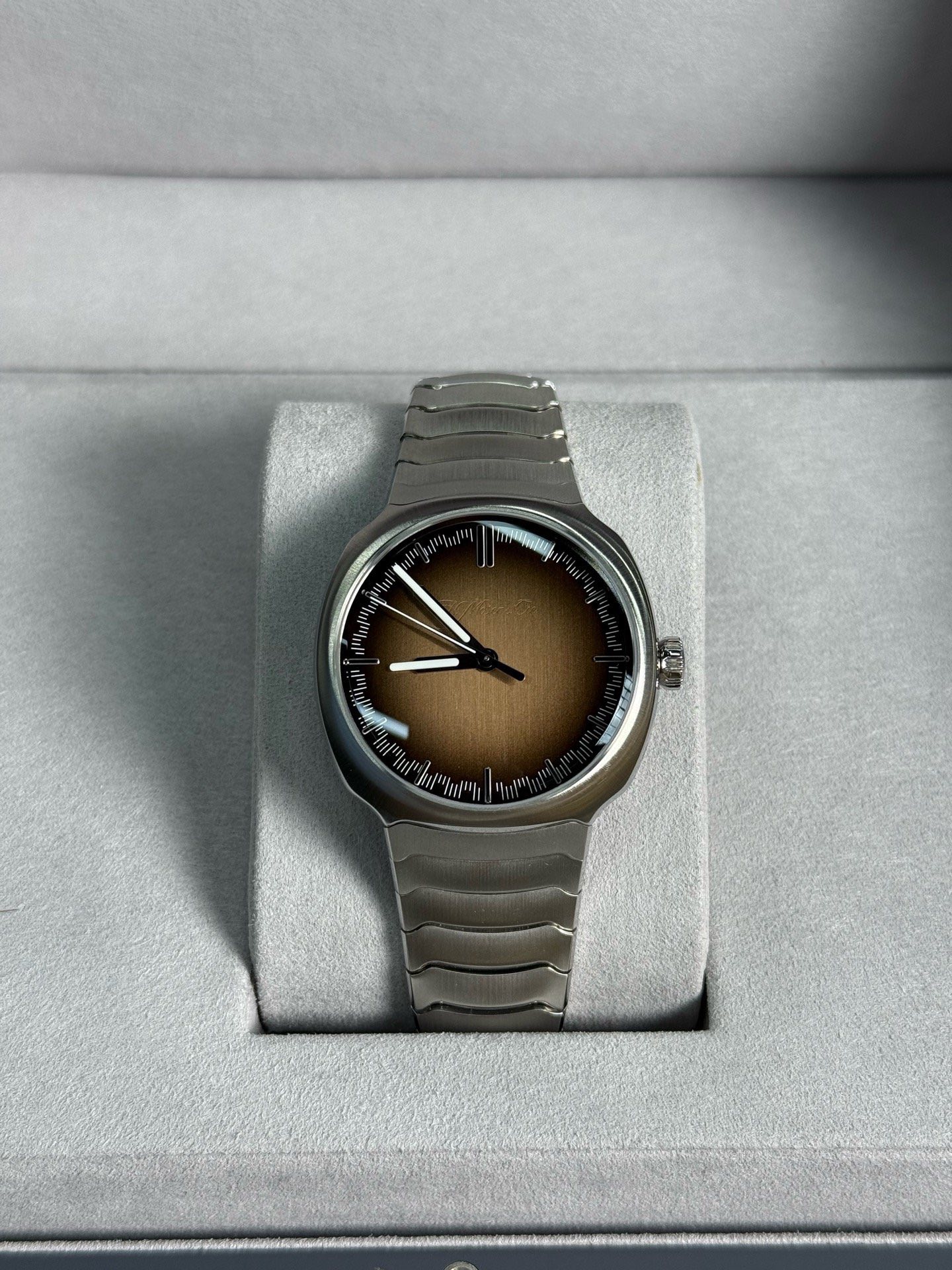 May be an image of wrist watch and text