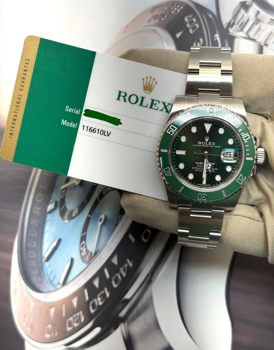May be an image of wrist watch and text that says 'GUARANTEE INTERNATIONAL Serial ROLEX Model 116610LV 50 ROLE ROLEX x PPETUNE G 110 郾郾 QU SUBN 20 00 EXRO XROL RO OEI CEI'