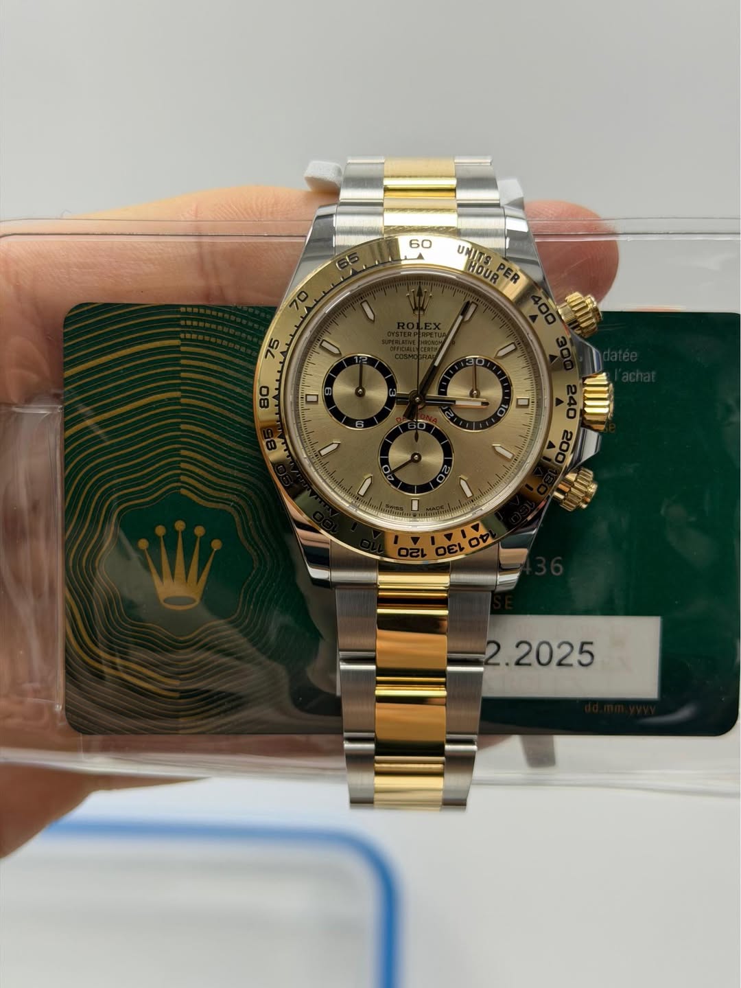 May be an image of wrist watch and text