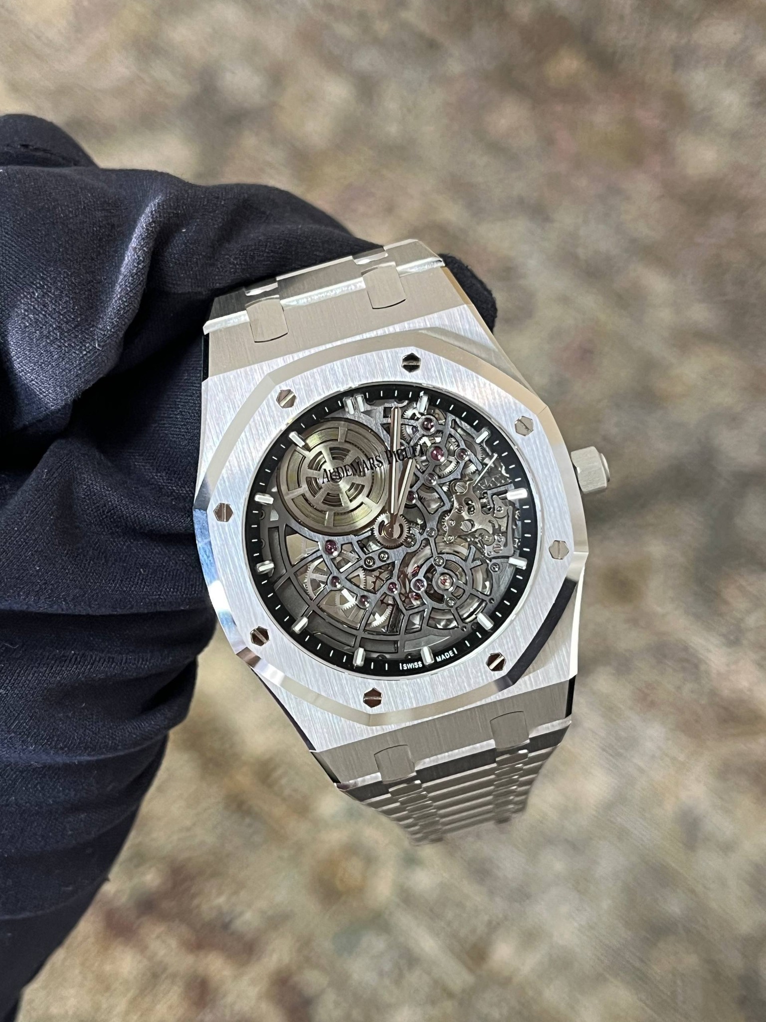May be an image of wrist watch and text