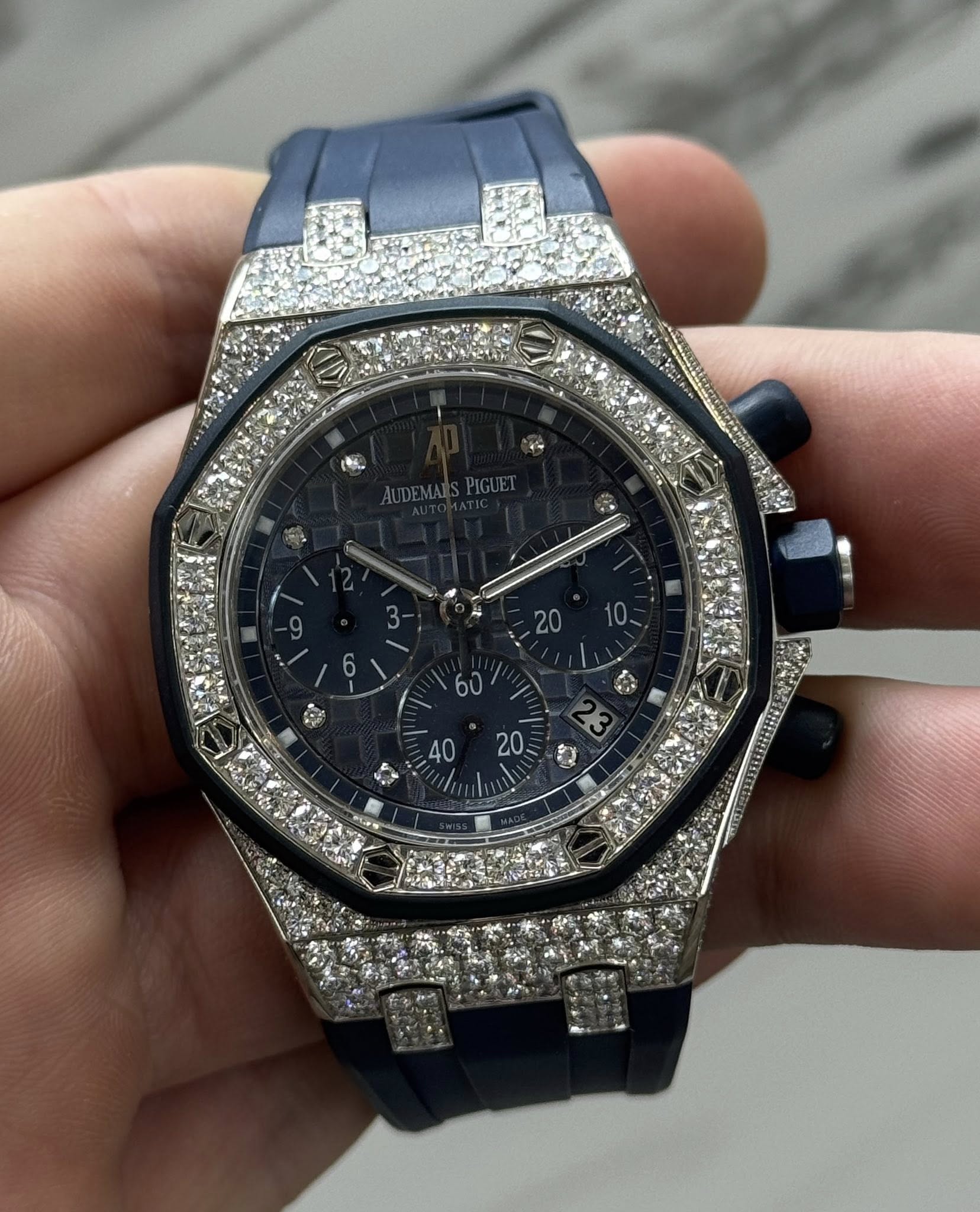May be an image of wrist watch and text