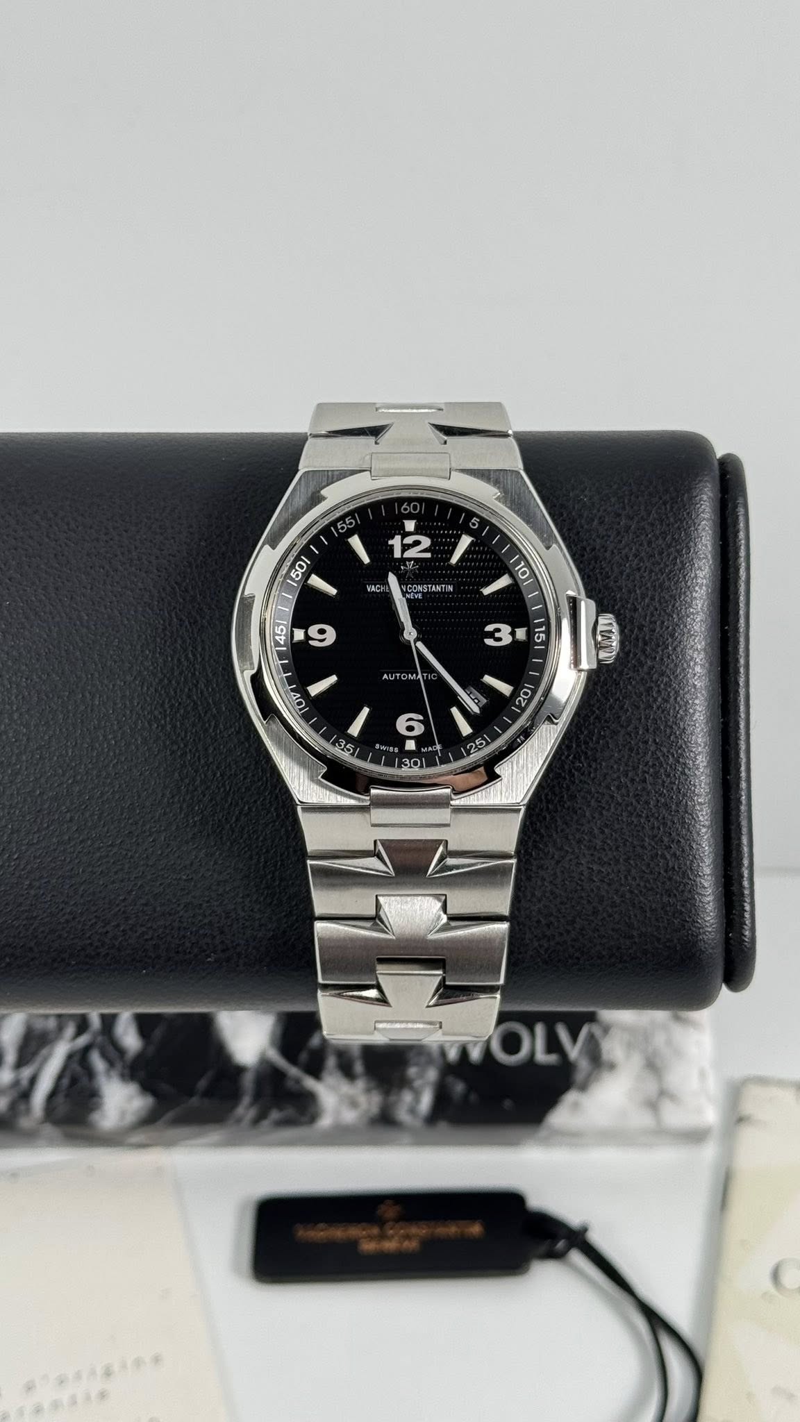 May be an image of wrist watch and text