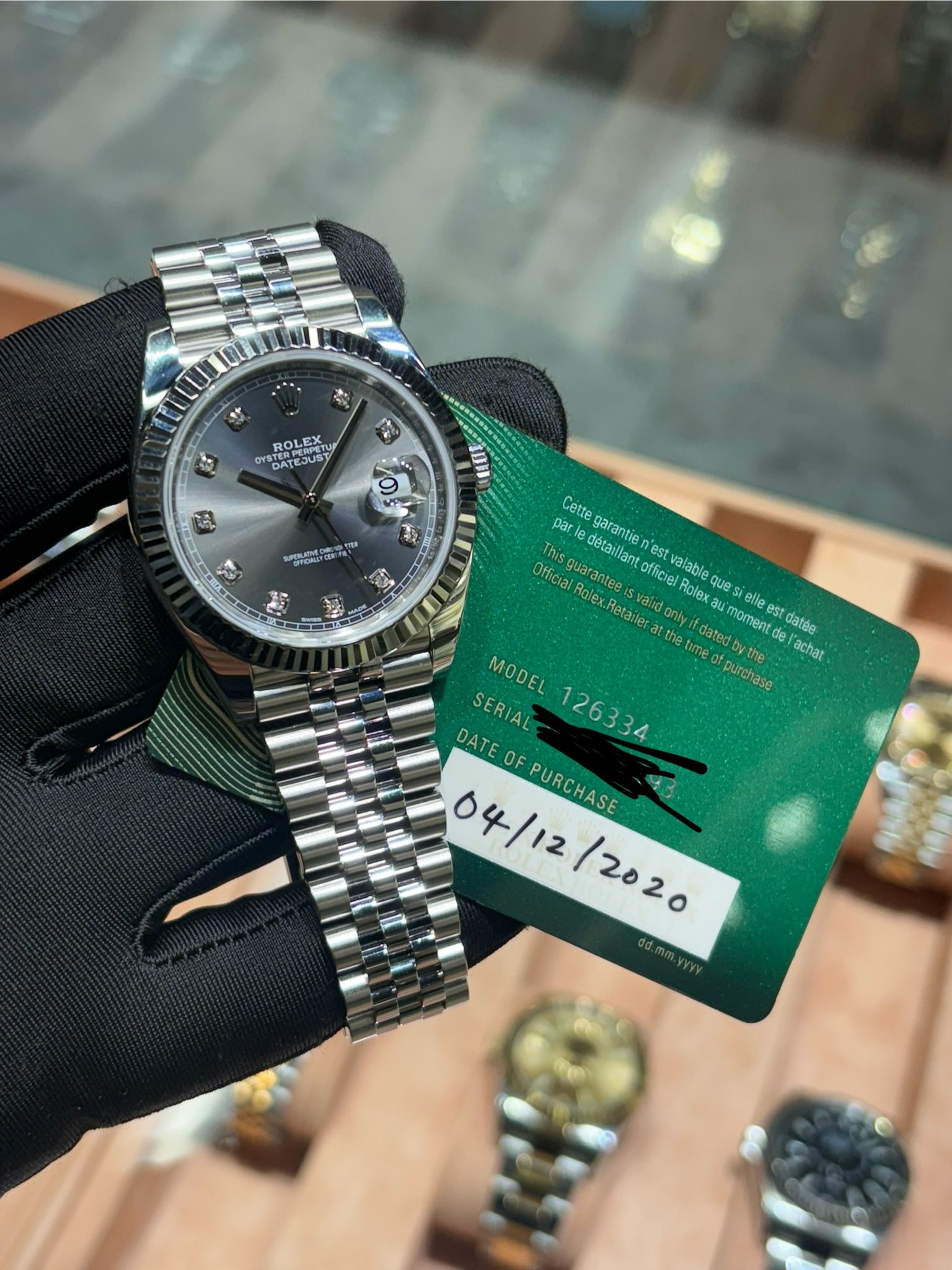 May be an image of wrist watch and text that says 'ROLEX SRT NOA DATEJUST JUST 序 福 9 CN قد 有 Cette garantie צש"ת par par d detaillant Official hisquaranten aranteg officiel…