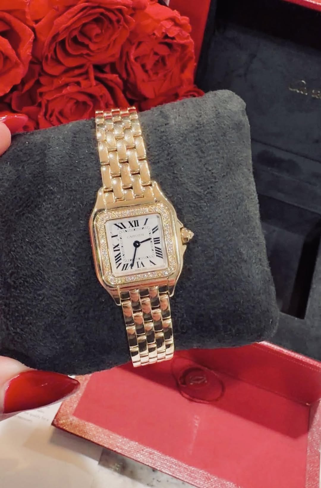 May be an image of wrist watch and text