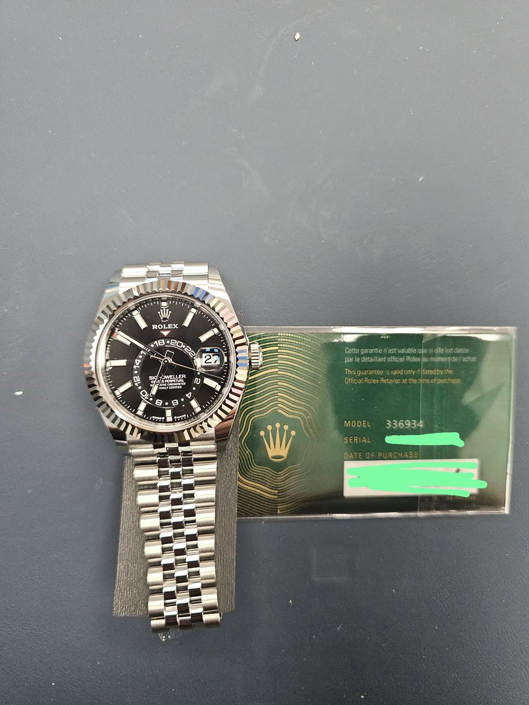 May be an image of wrist watch and text
