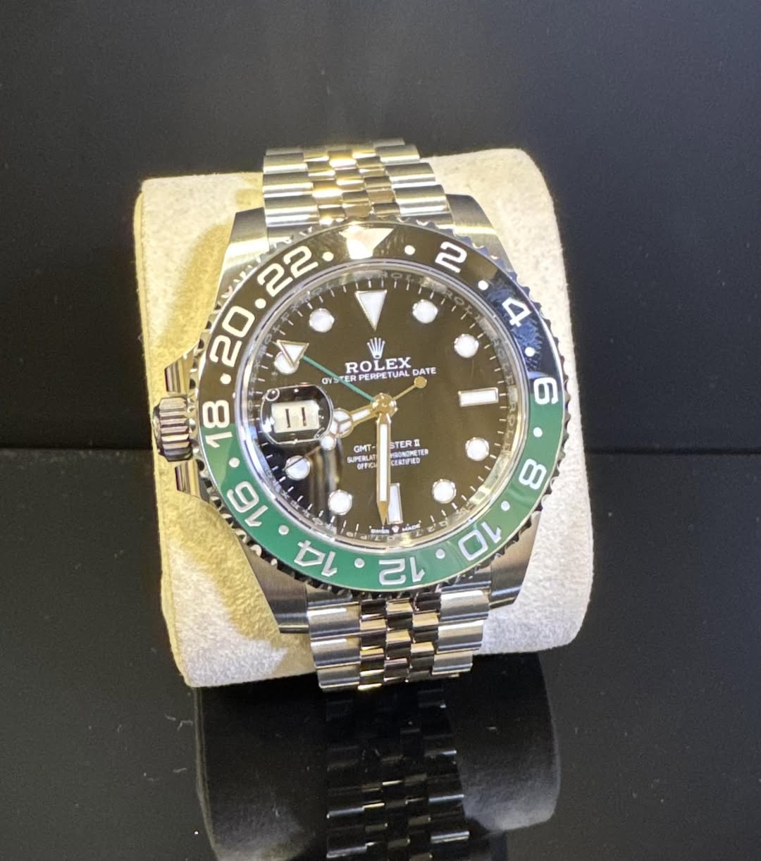 May be an image of wrist watch and text