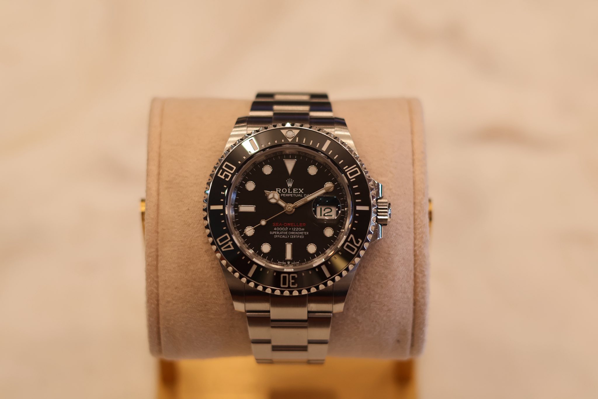 May be an image of wrist watch and text