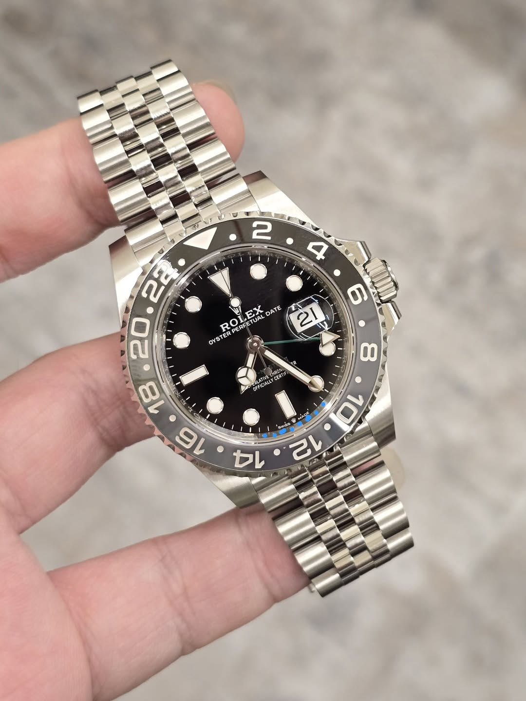 May be an image of wrist watch and text