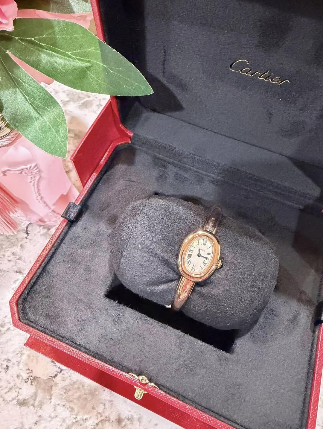 May be an image of ring, wrist watch and text