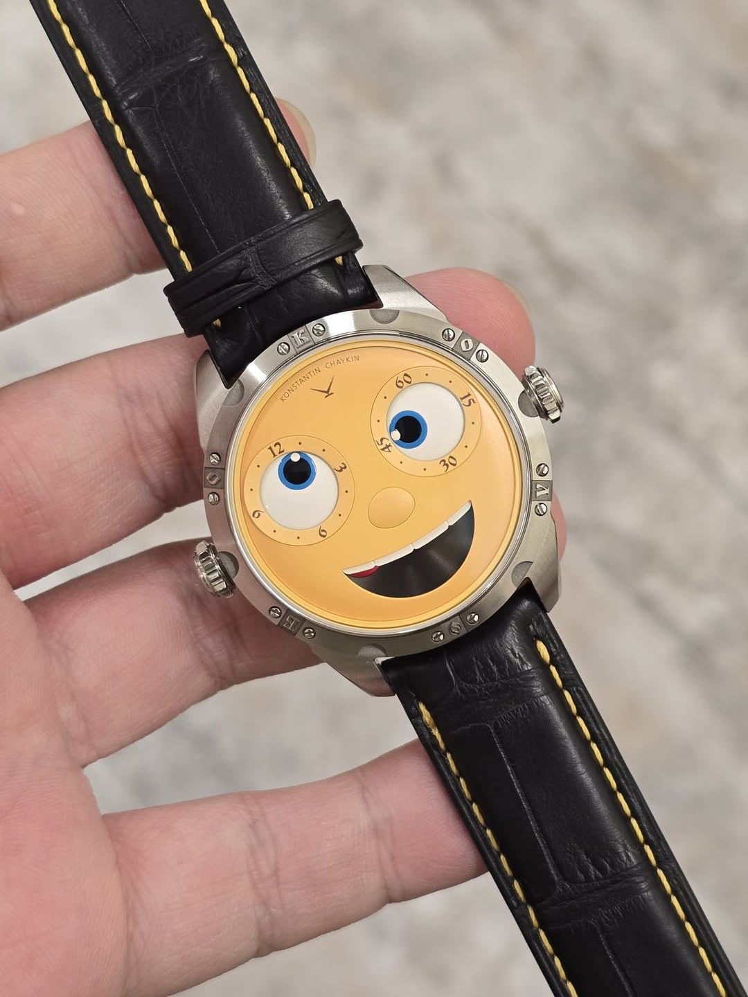 May be an image of wrist watch, leather and text that says 'ស O CHAYEIN KONS ONSTANTIN ANTIN 60 15 12 ر N 300 W 3 7 3 oF ٩ و ৩ ΘΑΘ G'