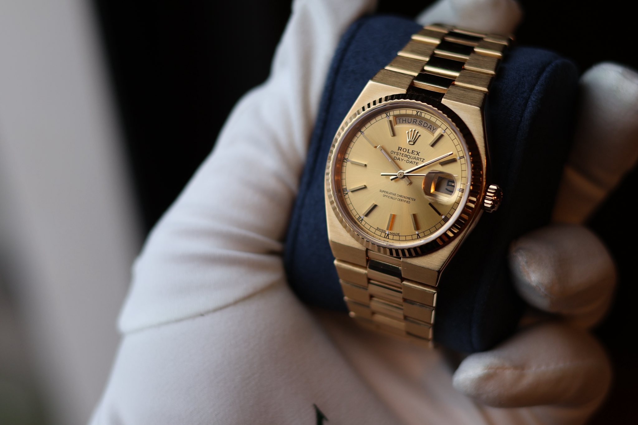 May be an image of wrist watch and text