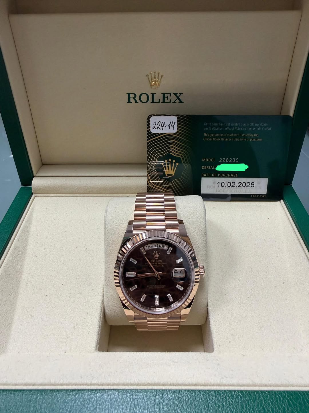May be an image of wrist watch and text