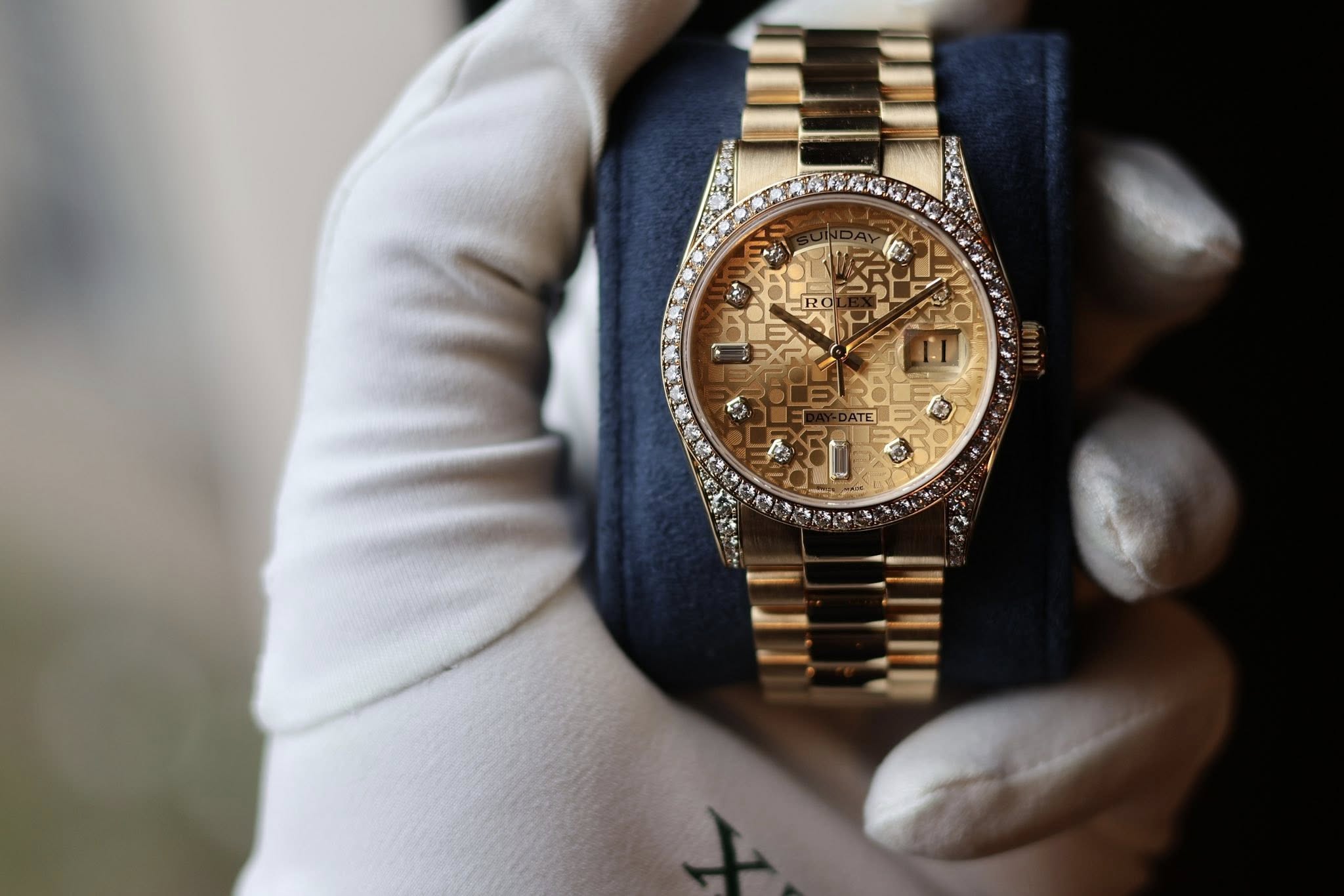 May be an image of wrist watch and text