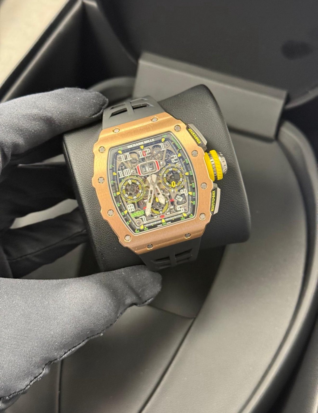 May be an image of wrist watch and text