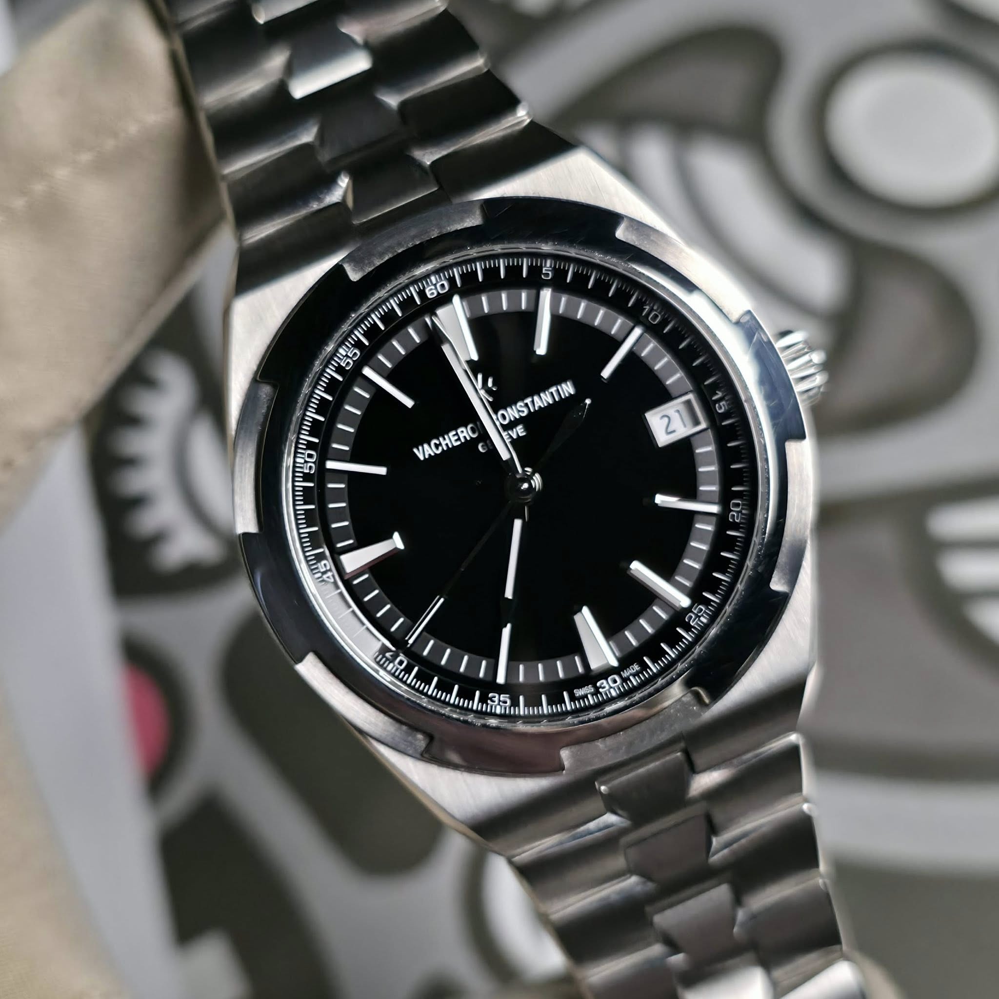 May be an image of wrist watch and text
