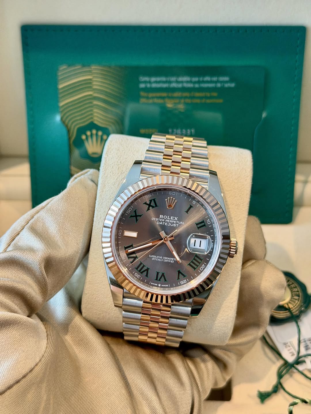 May be an image of wrist watch and text