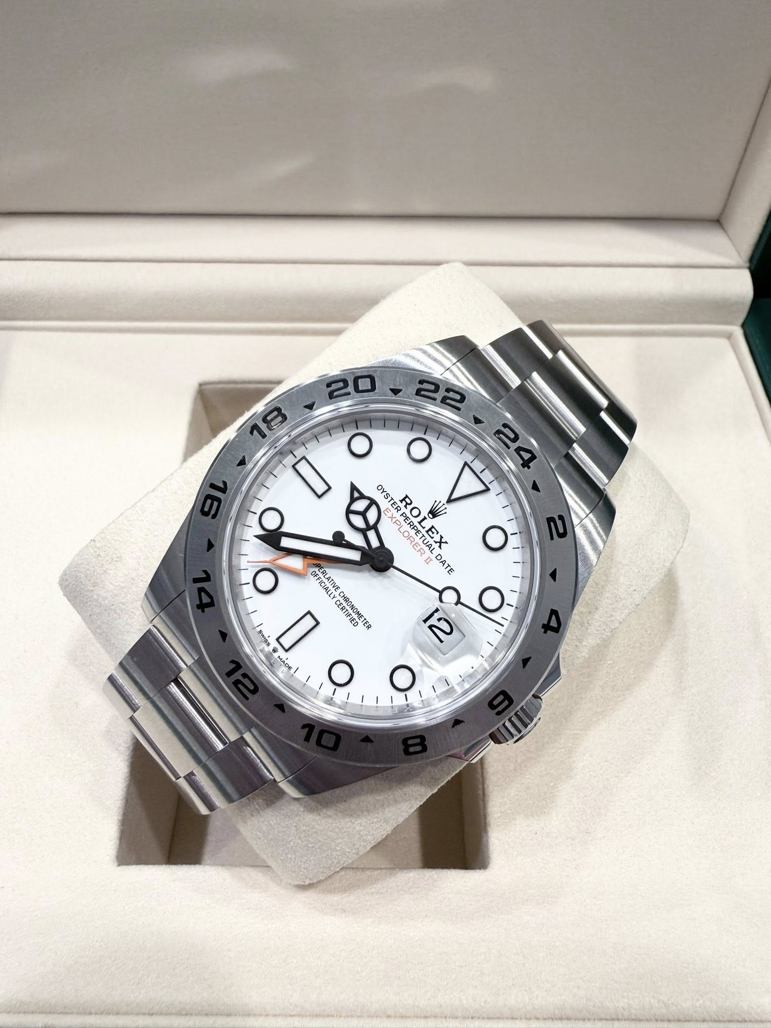 May be an image of wrist watch and text