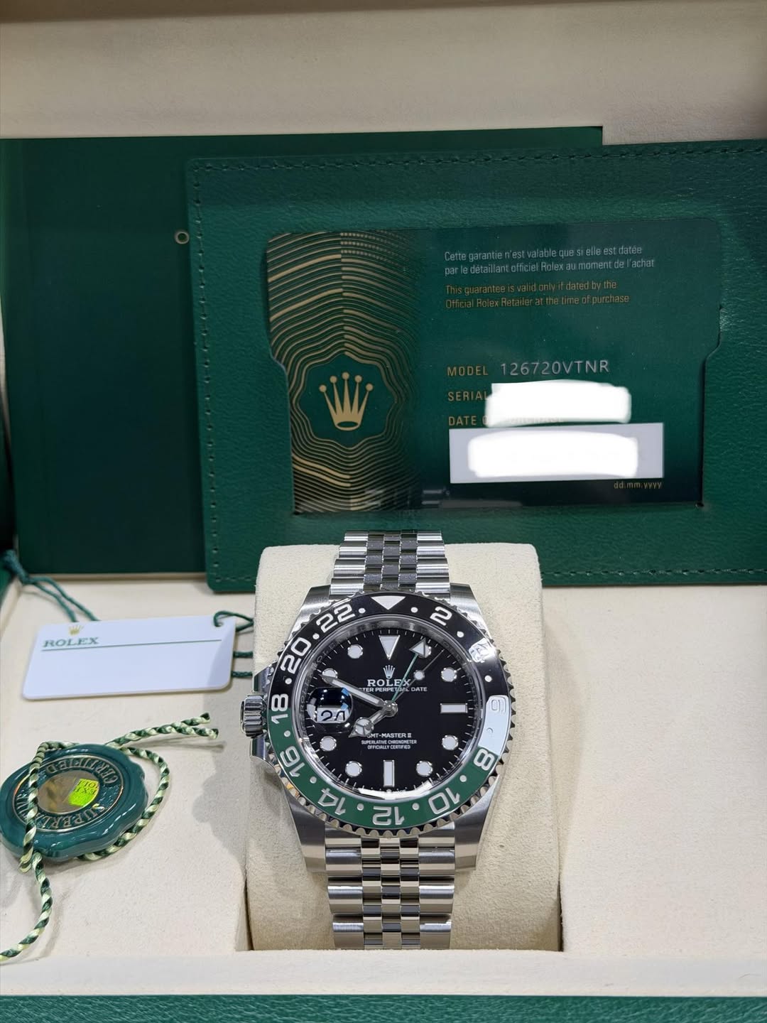 May be an image of wrist watch and text