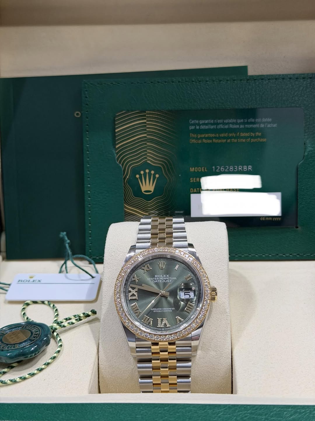 May be an image of wrist watch and text