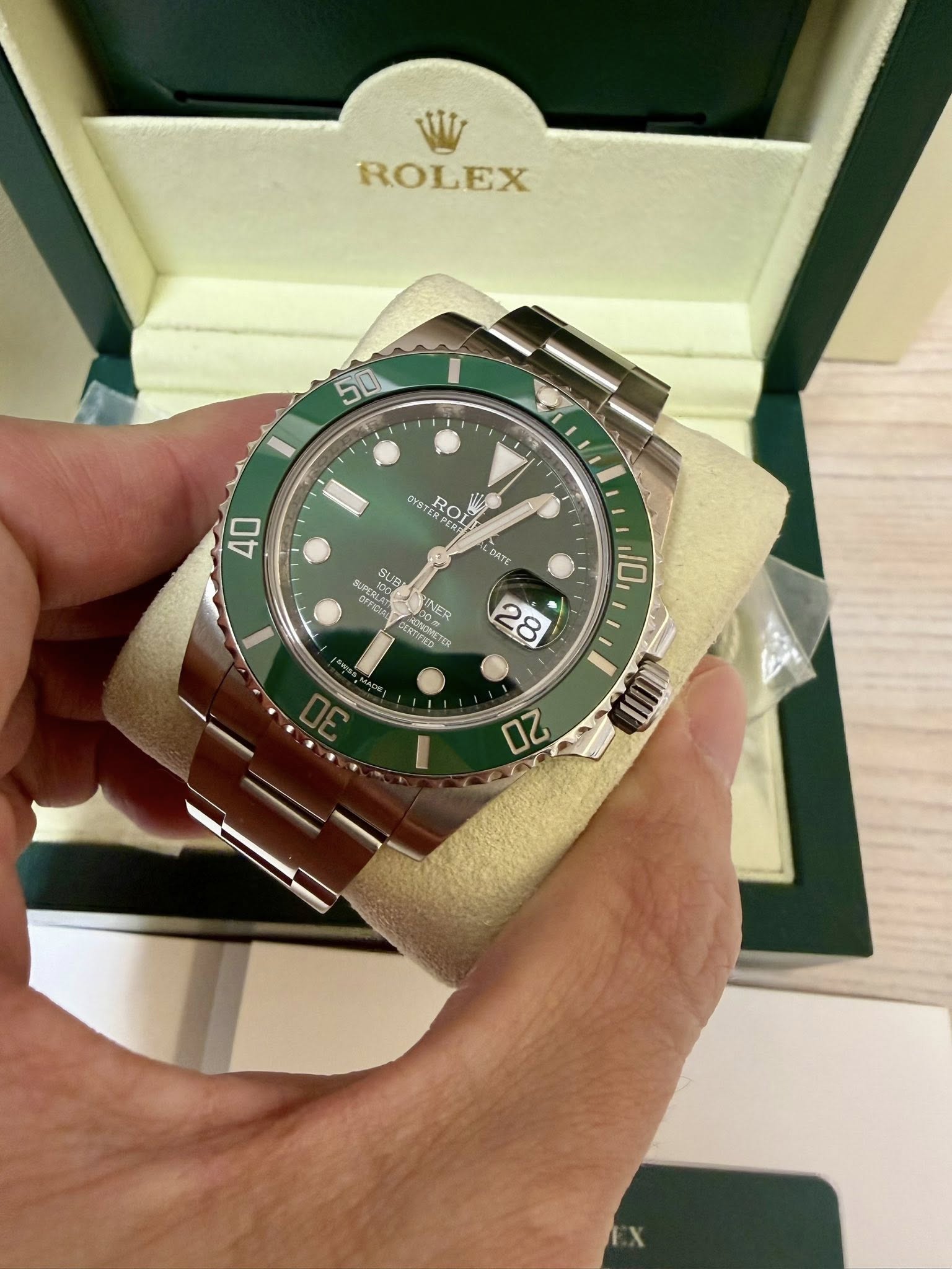 May be an image of wrist watch and text