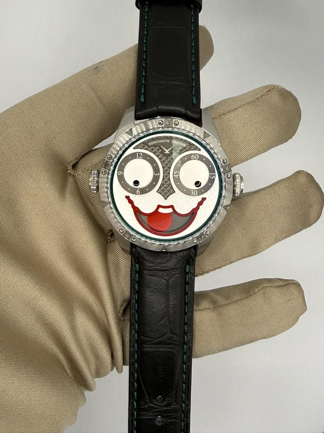 May be an image of wrist watch and text