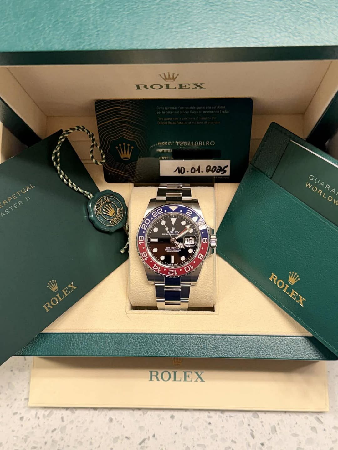 May be an image of wrist watch and text that says 'WW ROLEX . 00a5 ASTERI RPETUA ΑPETИA 2 A WORLD WORLD WORLOH GUARA פלר ROLEX LEX X 18 ى α 20 어니 BINS 80 12 10 ROLEX ROLEX ROLB文…