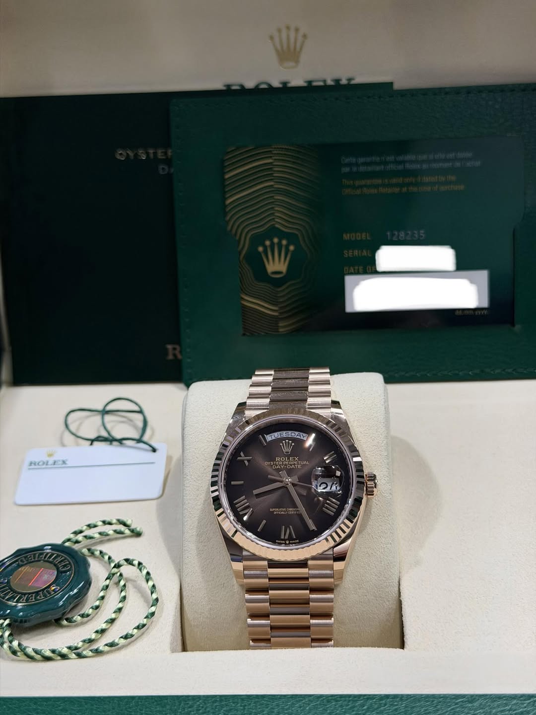 May be an image of wrist watch and text