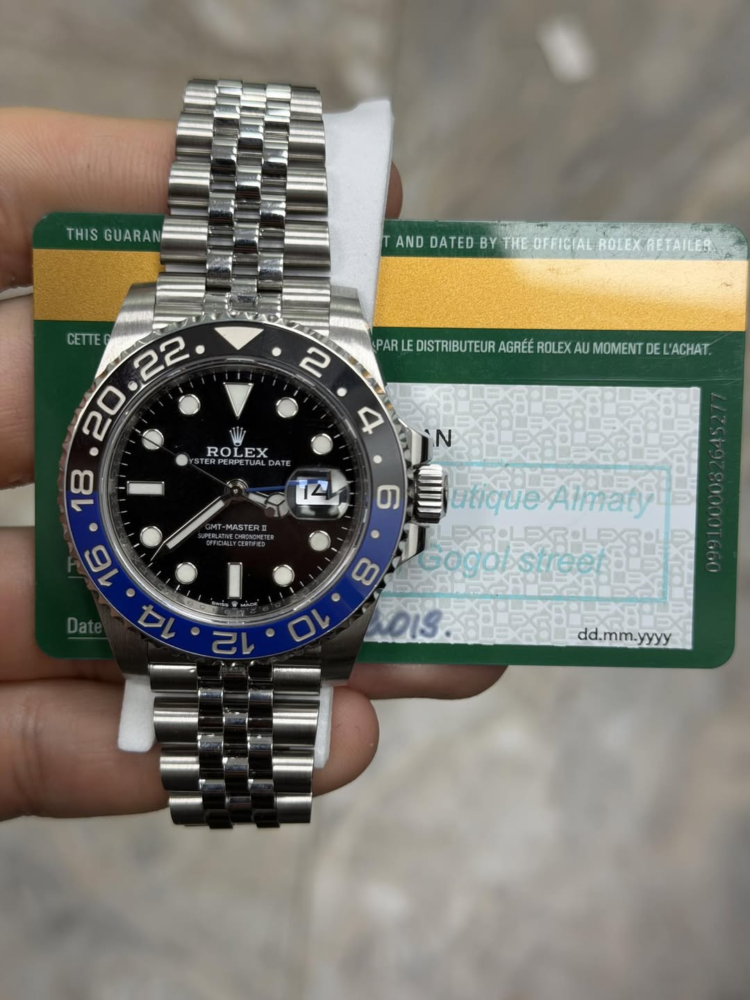 May be an image of wrist watch and text