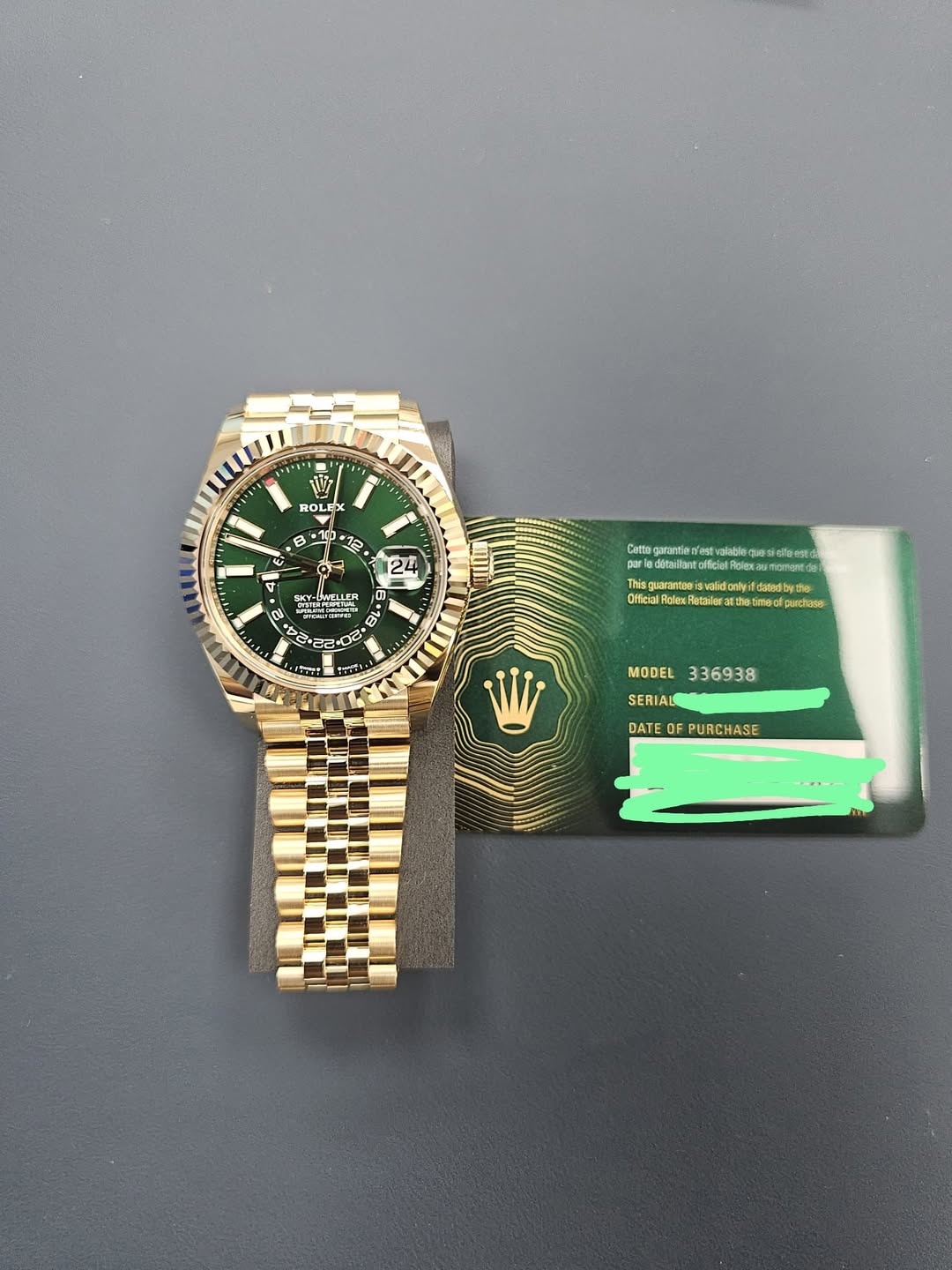 May be an image of wrist watch and text