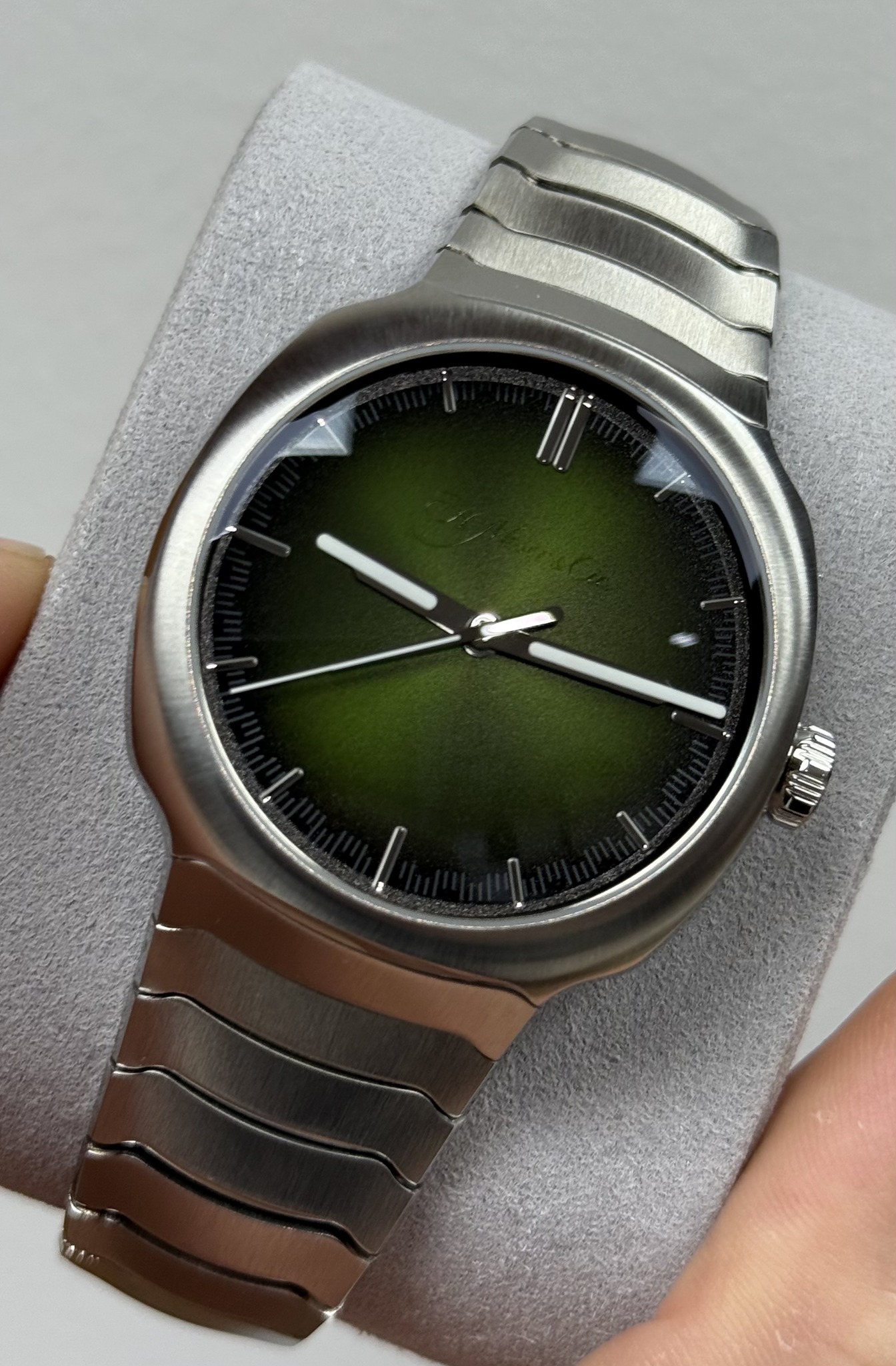 May be an image of digital watch and text