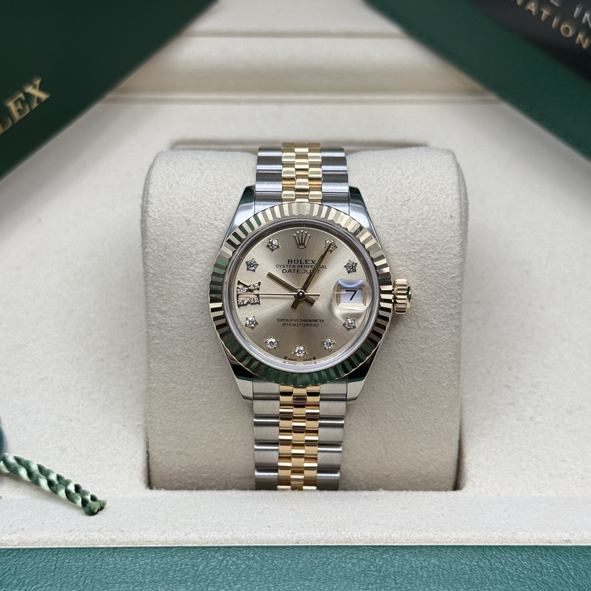 May be an image of wrist watch and text