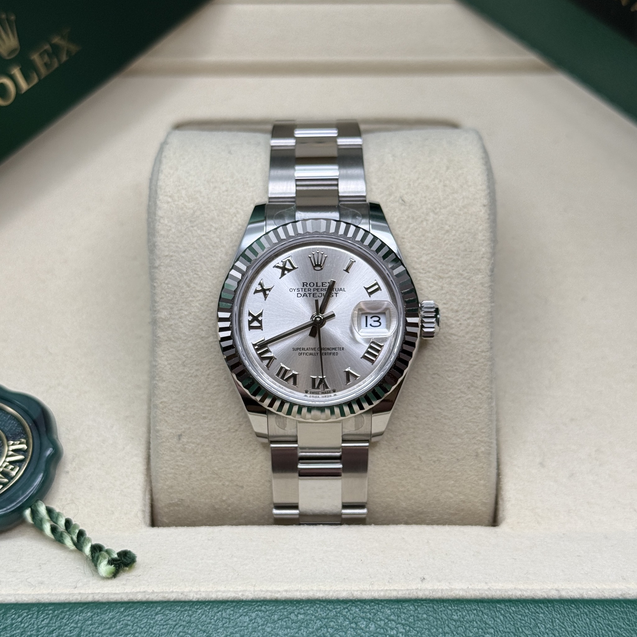 May be an image of wrist watch and text