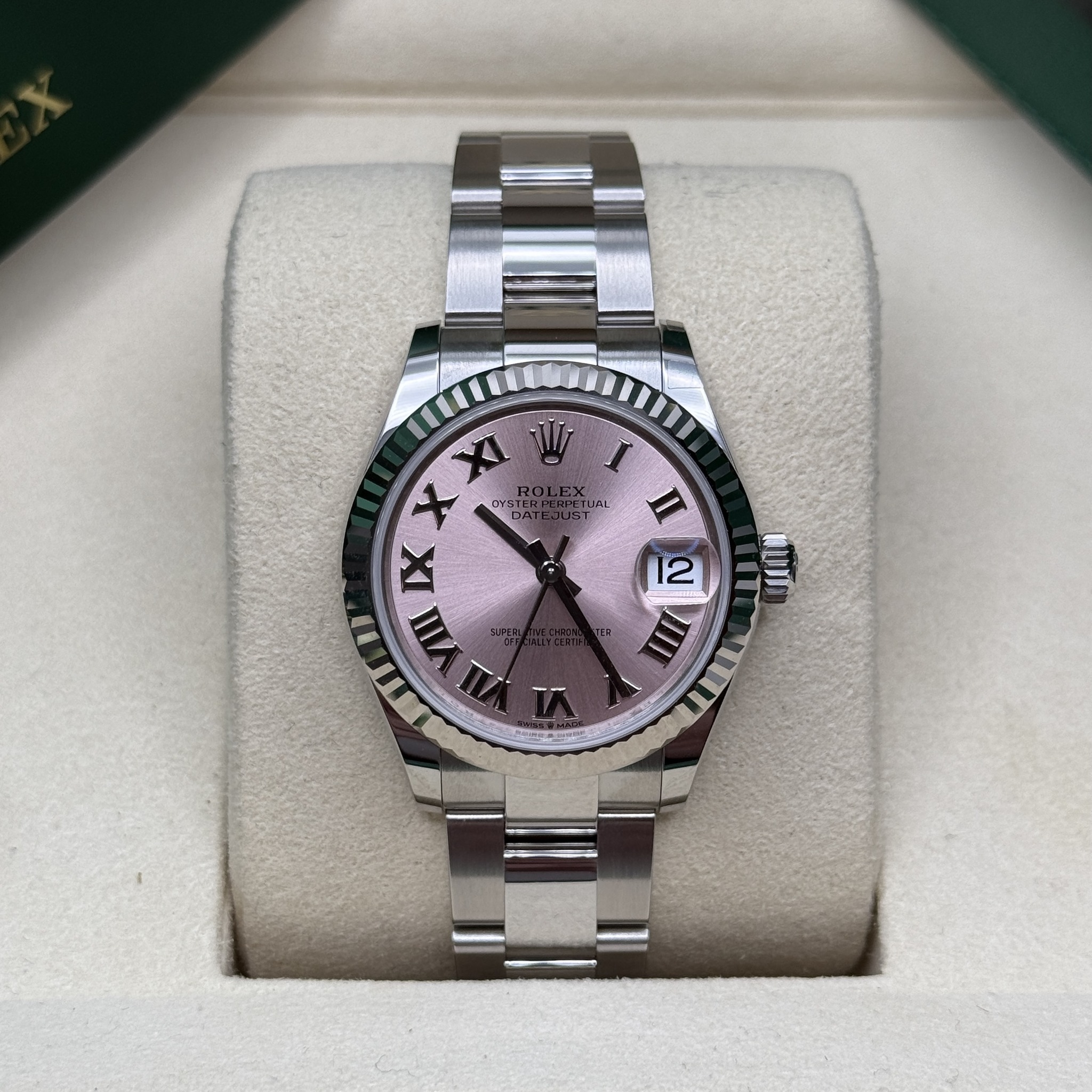 May be an image of wrist watch and text that says 'V X ፓንድቨ IX I II W LIAL n 2M I ญ KIn'
