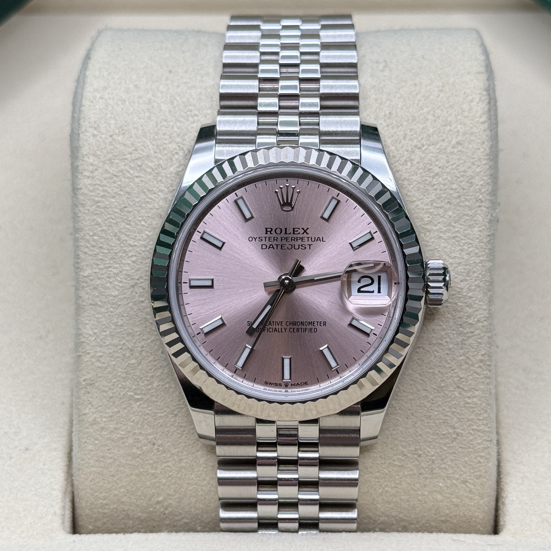 May be an image of wrist watch and text that says '0 I OYST PETUAL UAL PETU UST ኢ 21 ! ወስ'