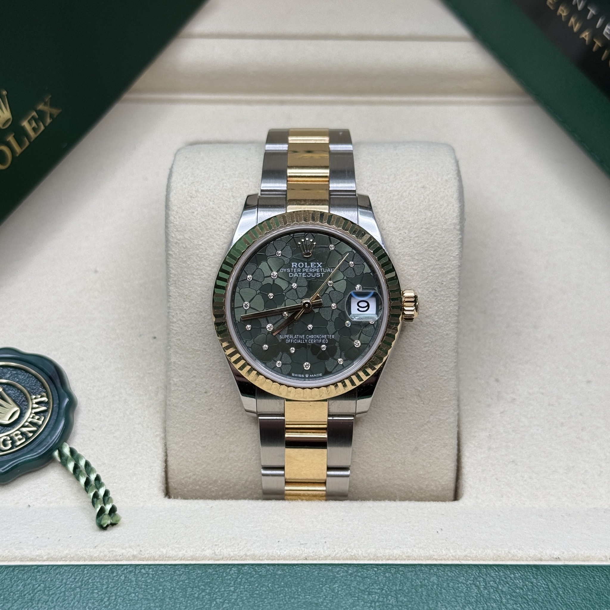 May be an image of wrist watch and text