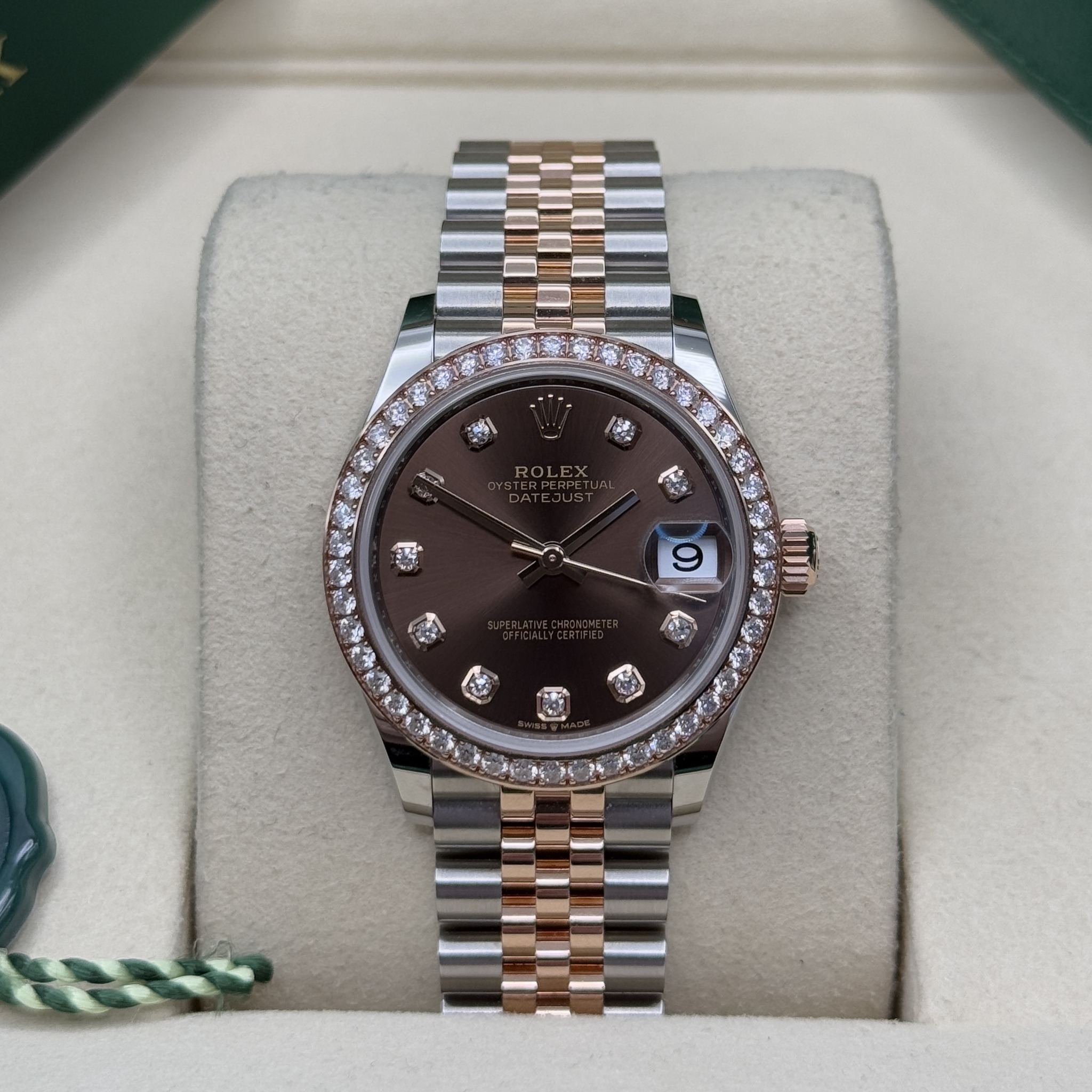 May be an image of wrist watch and text