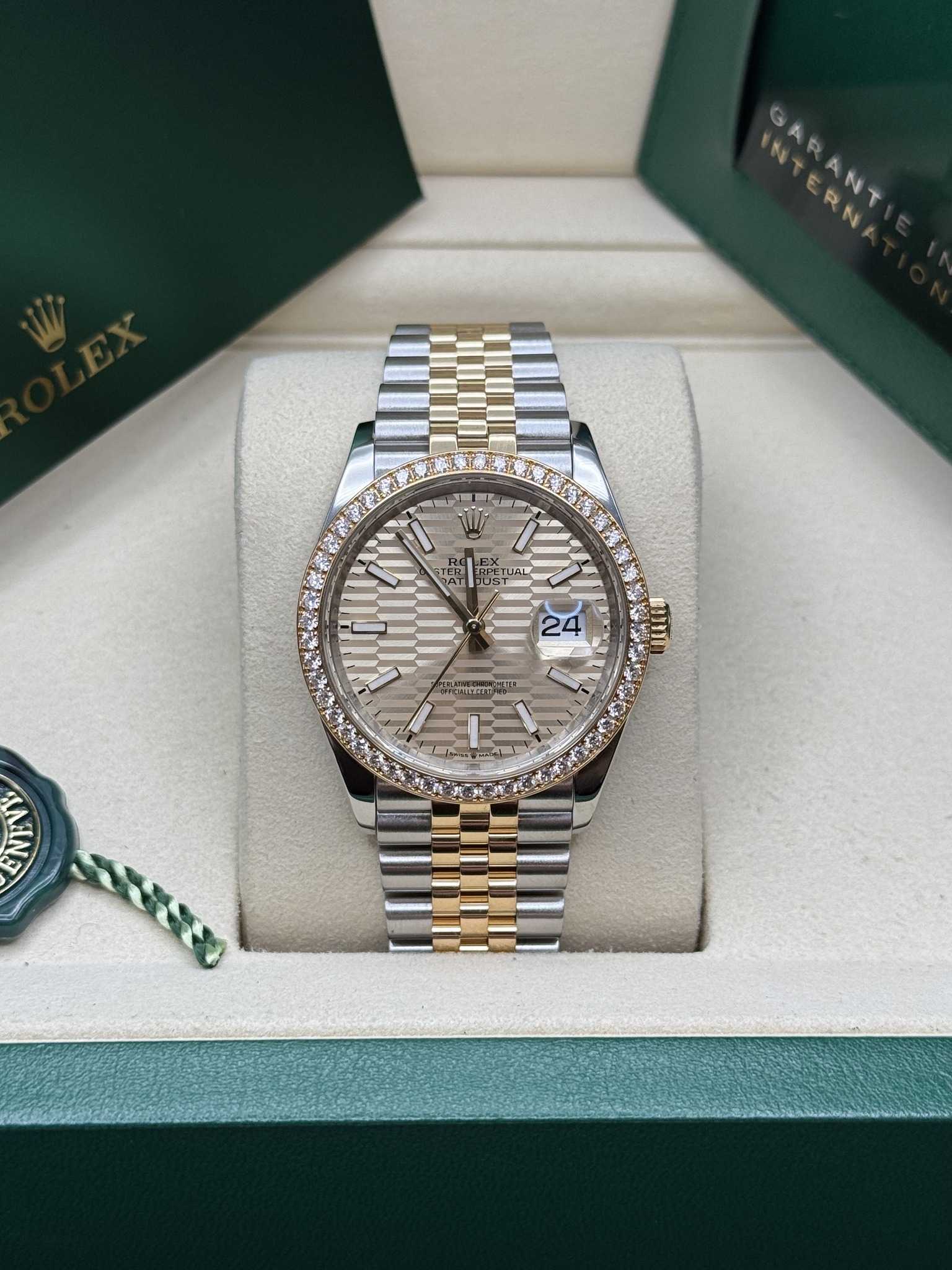 May be an image of wrist watch and text