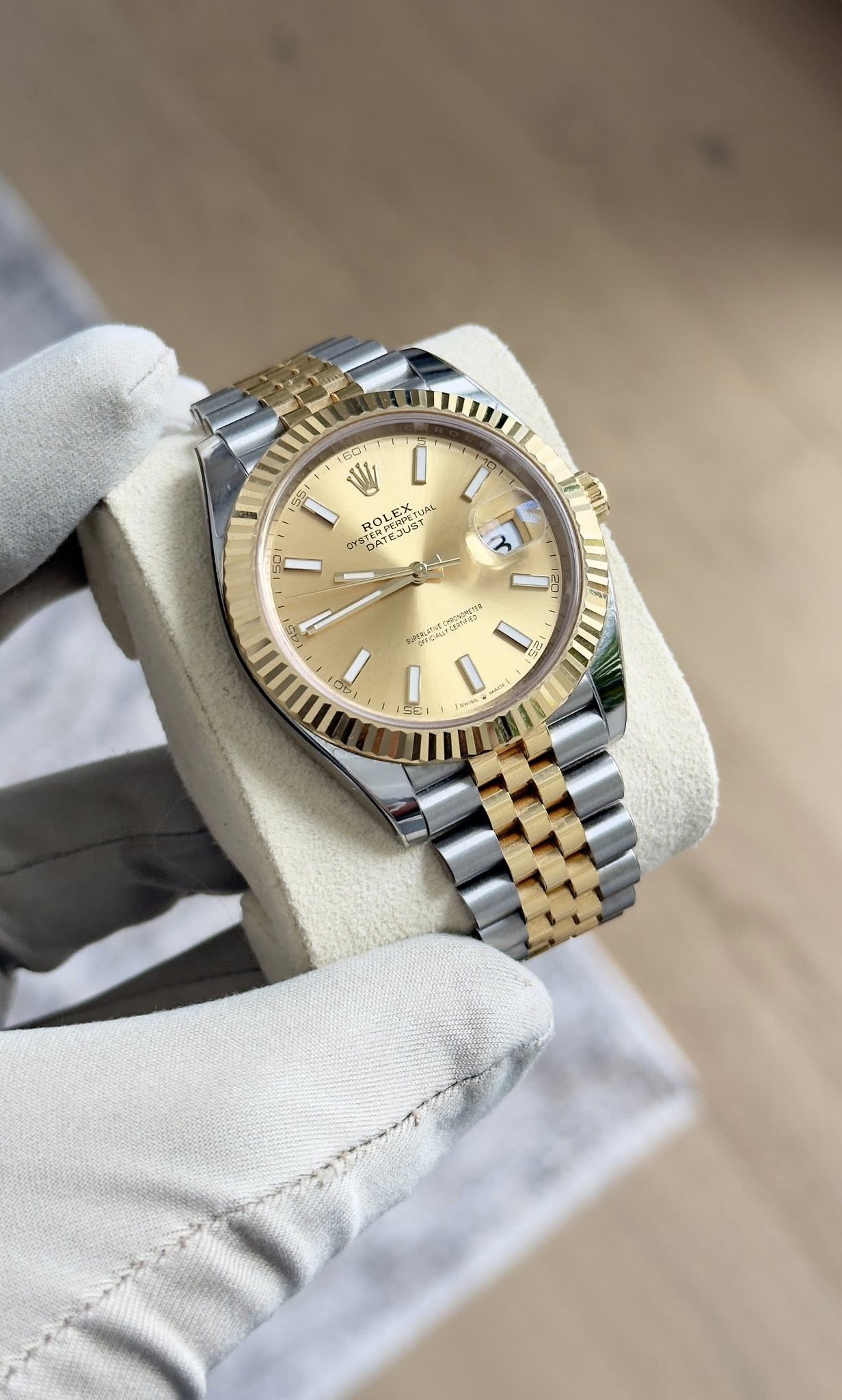May be an image of wrist watch and text