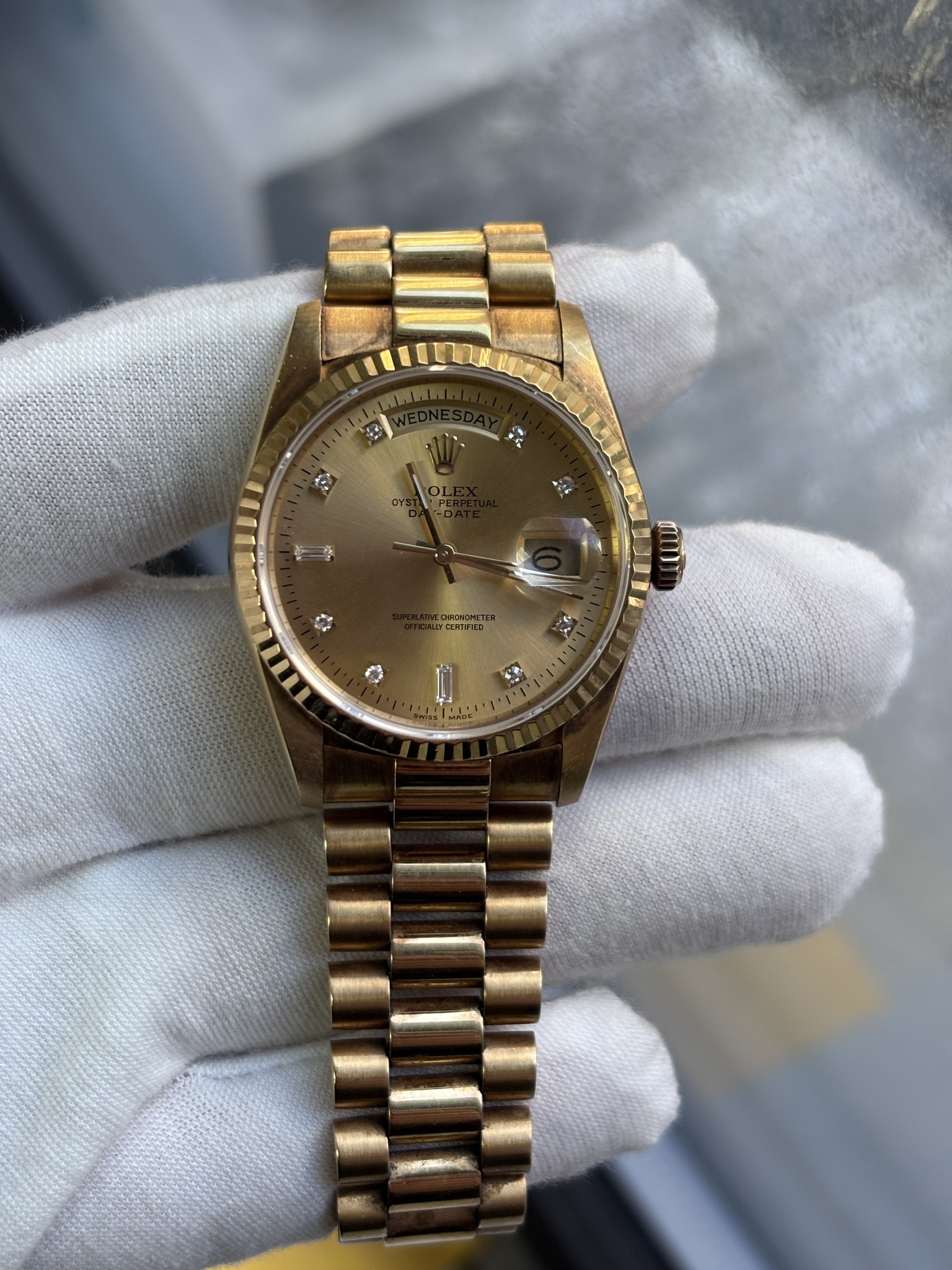 May be an image of wrist watch and text