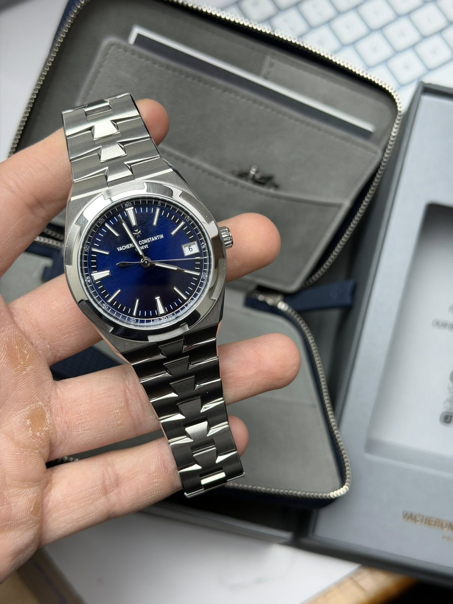 May be an image of wrist watch and text