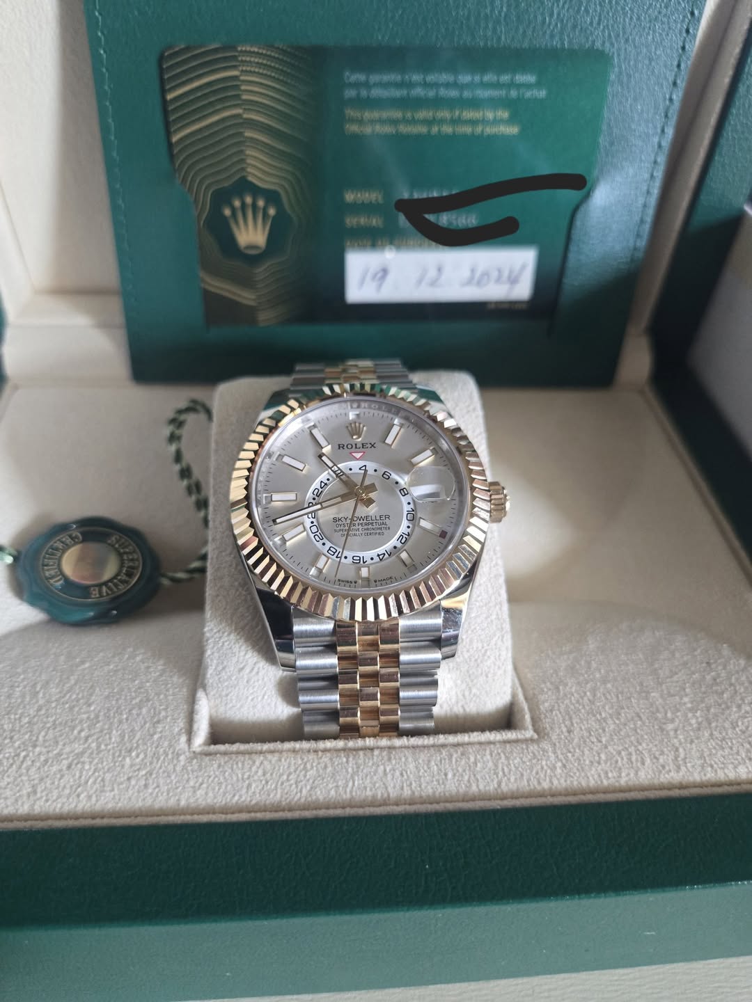 May be an image of wrist watch and text