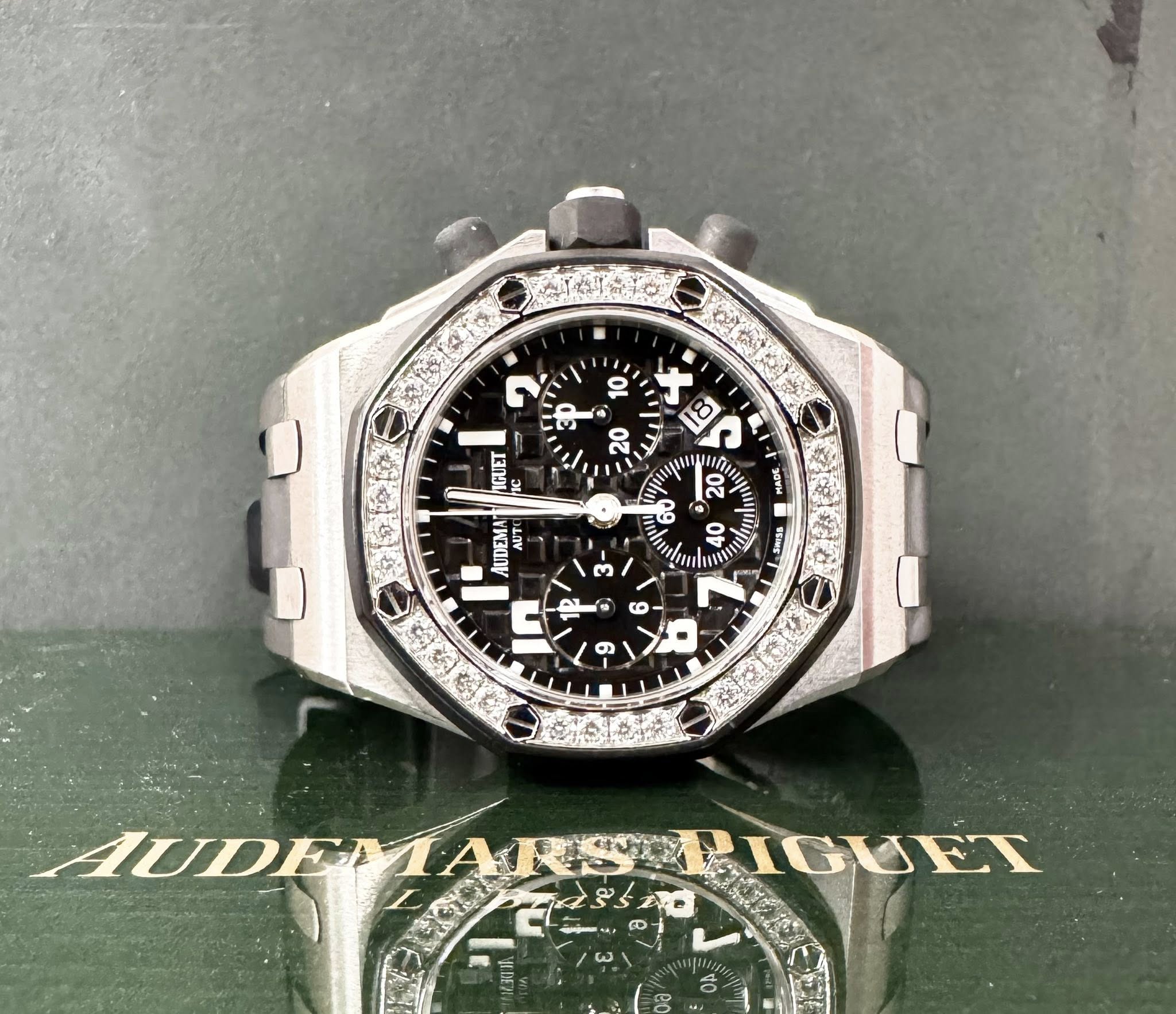 May be an image of wrist watch and text