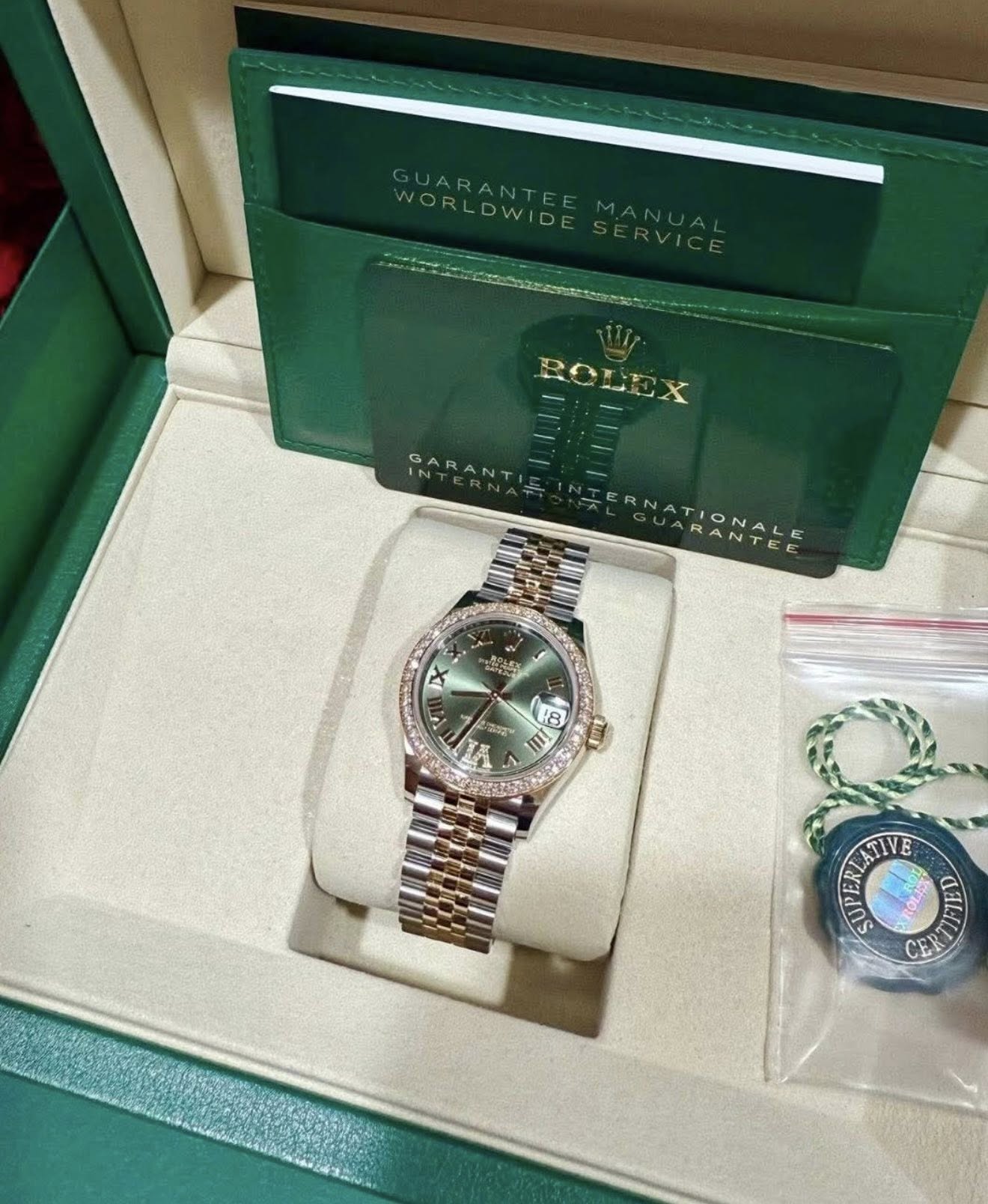 May be an image of wrist watch and text