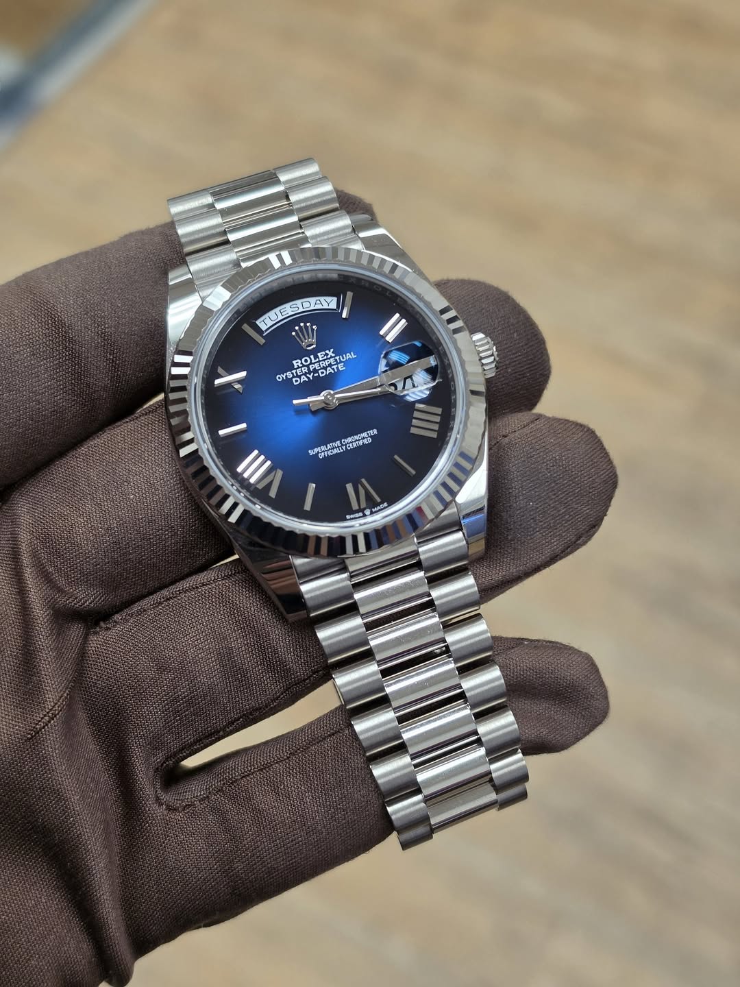 May be an image of wrist watch and text