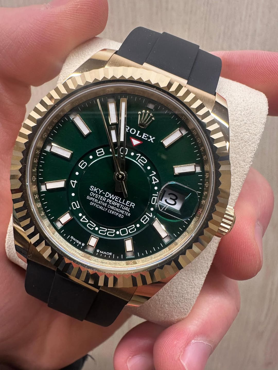May be an image of wrist watch and text