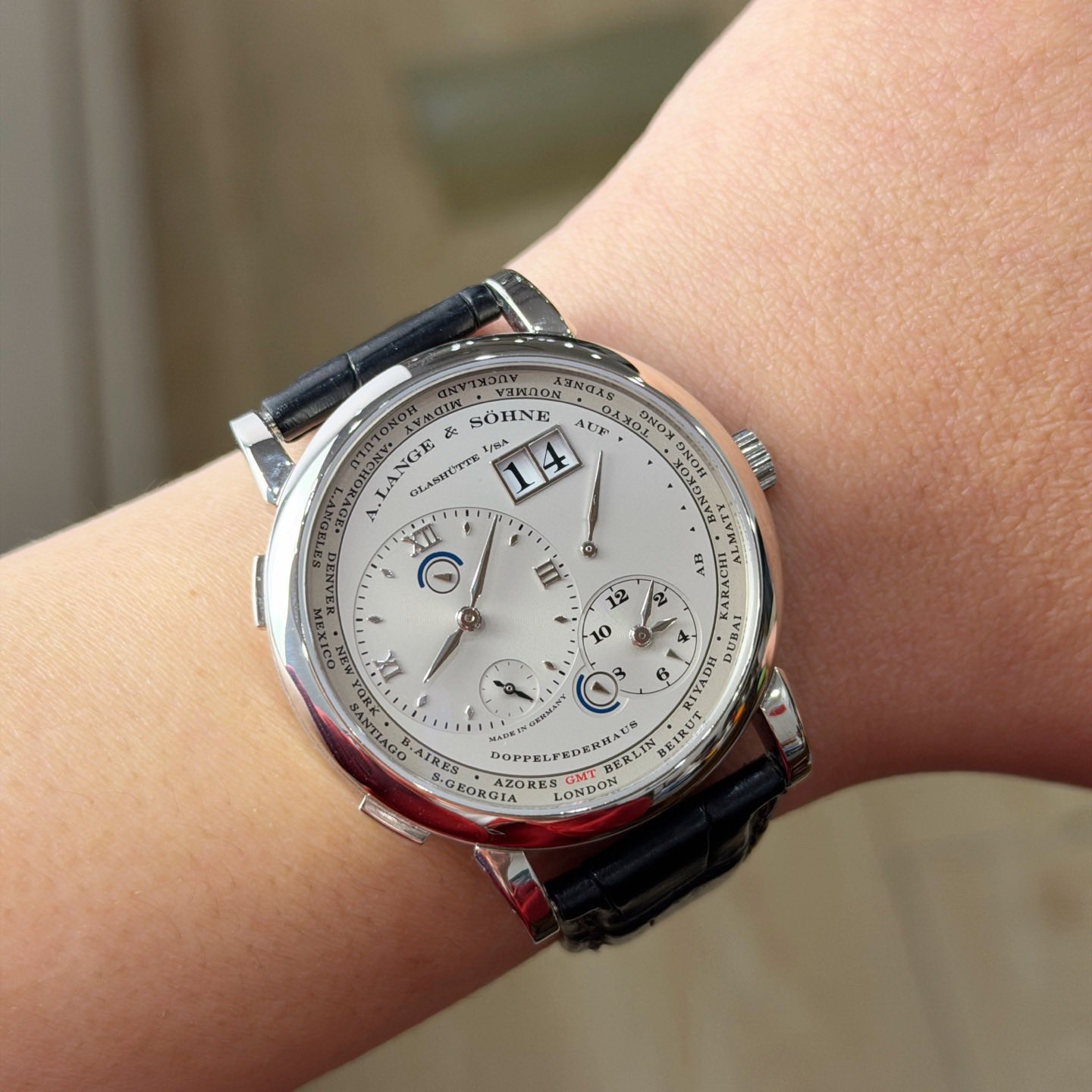 May be an image of wrist watch and text