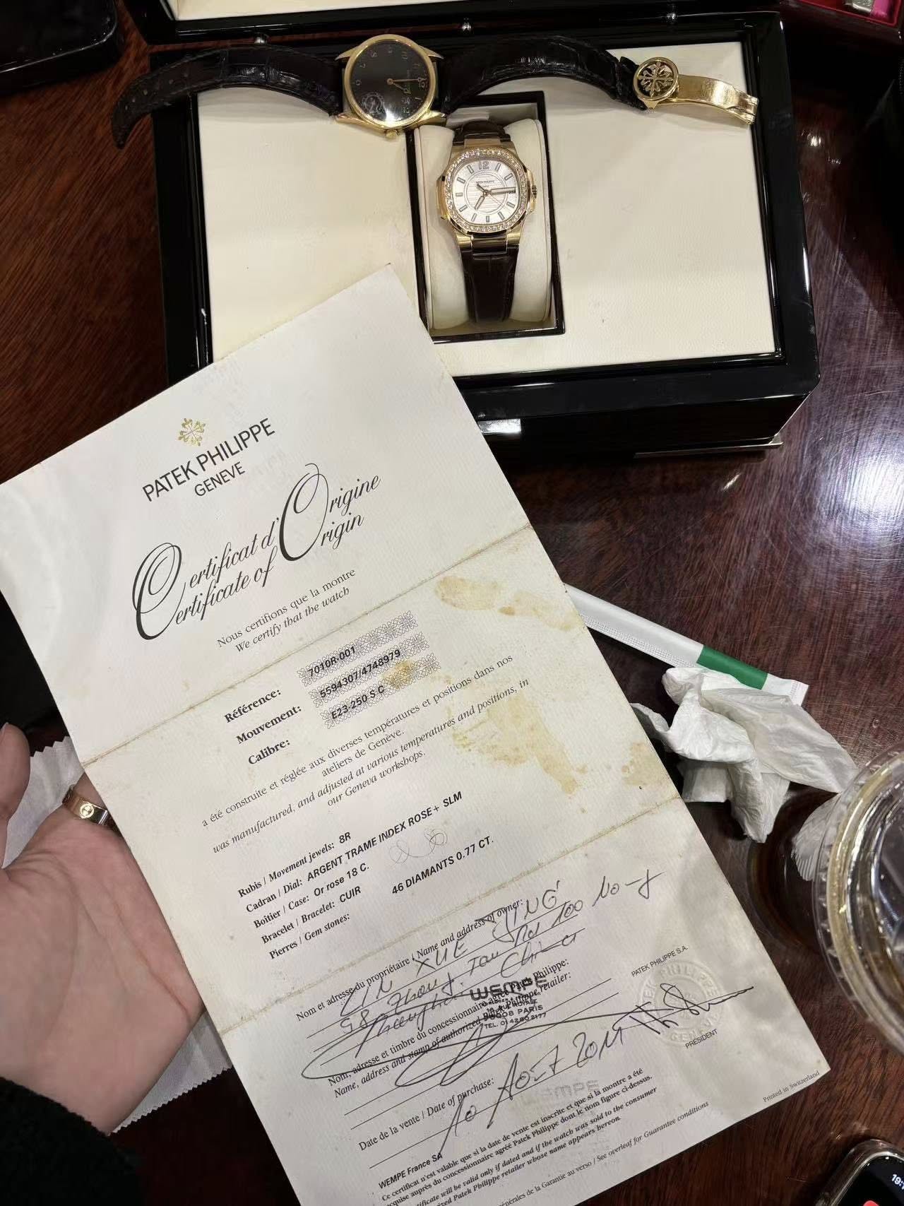 May be an image of ticket stub, wrist watch and text