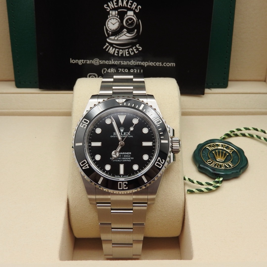 May be an image of wrist watch and text that says 'SNEAKERS TIMEPIECES sneakersandtimepi leces com longtr 7481 750 וודם 50 مز 10 LEX LE 51 TUnL I ARINER شت CENEVE'